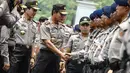 Kapolri Jenderal Pol Sutarman saat mengahadiri apel pengamanan pelantikan presiden dan wakil presiden di halaman Monumen Nasional, Jakarta, Jumat (17/10/2014) (Liputan6.com/Faizal Fanani)