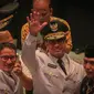 Gubernur dan Wagub DKI Jakarta Anies Baswedan dan Sandiaga Uno menyapa tamu undangan usai sertijab di Balai Kota, Jakarta, Senin (16/10). Anies-Sandi resmi menjadi Gubernur dan Wakil Gubernur DKI Jakarta periode 2017-2022. (Liputan6.com/Faizal Fanani)