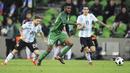 Bek Nigeria,Chidozie Awaziem, menggiring bola saat melawan Argentina pada laga persahabatan di Stadion FK Krasnodar, Rabu (15/11/2017). Argentina kalah 2-4 dari Nigeria. (AP/Sergey Pivovarov)