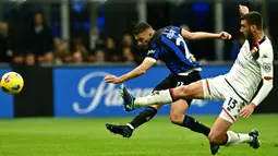 Di paruh pertama pertandingan, dua gol l Nerazzurri bersarang di gawang Genoa. (GABRIEL BOUYS/AFP)