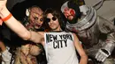 Heidi Klum, Thomas Hayo dan Tom Kaulitz menghadiri Pesta Halloween Tahunan ke-20 di Cathedrale, New York (31/11/2019). Supermodel asal Jerman ini tampil menyeramkan bak monster. (AFP Photo/Craig Barritt)