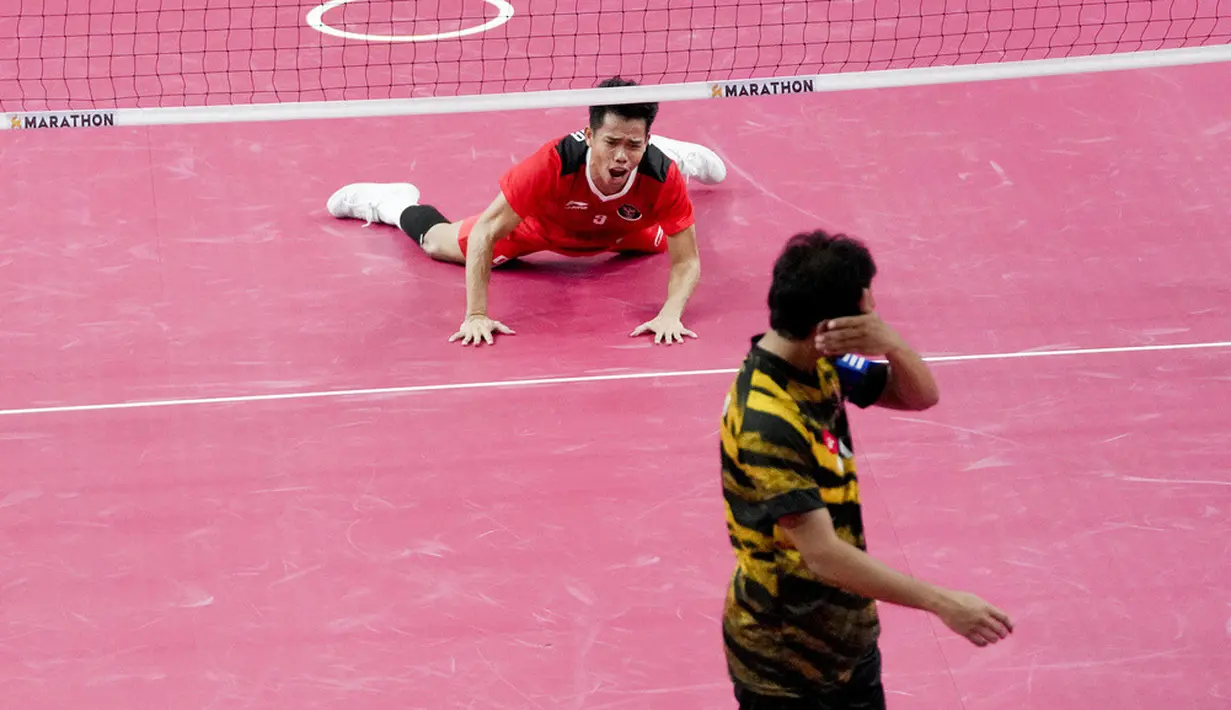 <p>Walau demikian, Rusdi dan Muliang bisa mempertahankan fokus mereka. Indonesia pun bisa memperbesar keunggulan dan meninggalkan jauh Malaysia. (AP Photo/Tatan Syuflana)</p>