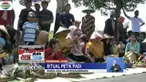 Sebagai rasa syukur atas panen berlimpah, warga Ponorogo, Jawa Timur, menggelar kirab ratusan tumpeng di pematang sawah.