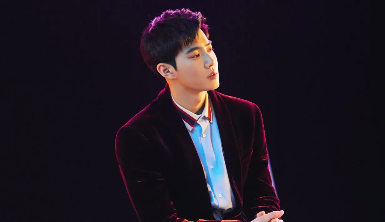 Ia pun menyebut jika Sehun dan D.O mempunyai banyak uang lantaran bermain dalam sebuah judul film. Ia juga bertanya-tanya apakah personel EXO lainnya tahu jika ia sedang syuting video klip. (Foto: Soompi.com)