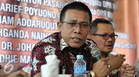 Anggota DPR RI fraksi PDI Masinton Pasaribu menyampaikan pandangannya dalam diskusi Publik Jokowi vs JK di kawasan Saharjo, Jakarta, Jumat (8/1/2016). Diskusi ini membahas Isu Resuffle Kabinet Jilid II. (Liputan6.com/JohanTallo)