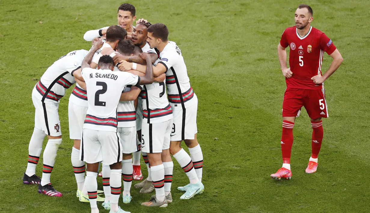 Pada laga kali ini megabintang Cristiano Ronaldo menyumbang dua gol pesta kemenangan Portugal atas Hungaria pada laga perdana Grup F Euro 2020. (AP/Laszlo Balogh, Pool)