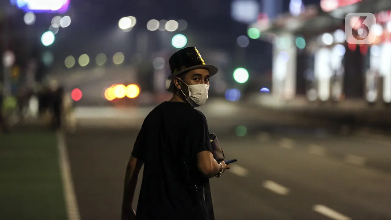 FOTO: Mobilitas Warga Saat Malam Tahun Baru 2022
