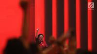 Ketua Umum PDIP Megawati Soekarnoputri membakar semangat kadernya saat pidato politiknya pada HUT ke-45 PDIP di JCC Senayan, Jakarta, Rabu (10/1). Megawati juga secara khusus menyampaikan terima kasih kepada para pendiri partai (Liputan6.com/Angga Yuniar)