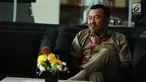 Rudi Alfonso menunggu diperiksa di gedung KPK, Jakarta, Rabu (1/11). Rudi Alfonso diperiksa sebagai saksi untuk tersangka Markus Nari terkait kasus merintangi penyidikan, dan keterangan palsu pada sidang kasus e-KTP. (Liputan6.com/Helmi Fithriansyah)