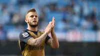 Pemain Arsenal, Jack Wilshere menempati urutan keempat pemain pilihan fans Manchester City dengan suara sebanyak 10%. (AFP/Paul Ellis)