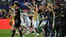 Pemain Argentina, Lionel Messi merayakan kemenangan timnya atas Kolombia pada laga final Copa America 2024 di Hard Rock Stadium, Miami, Florida, Senin (15/07/2024) WIB. (AFP/Chandan Khanna)