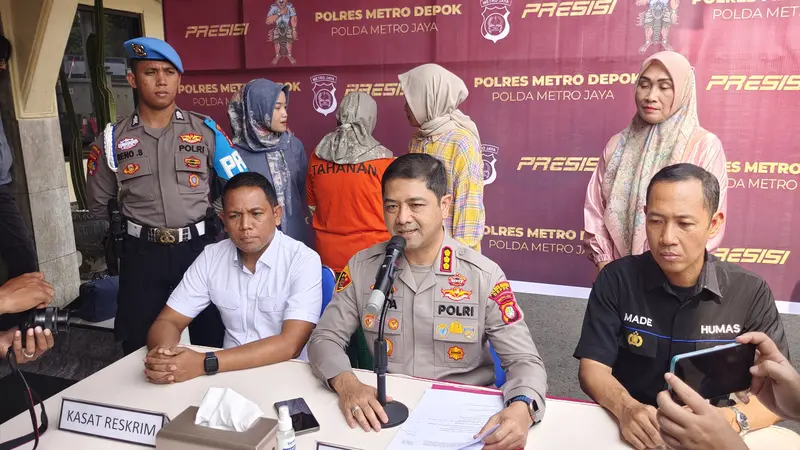 Tersangka kekerasan anak pada daycare, Meita Irianty saat dibawa ke Polres Metro Depok.