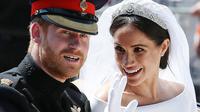 Sebelumnya, Pangeran Harry dan Meghan Markle menikah pada Mei 2018. Setahun kemudian pasangan tersebut dikaruniai seorang putra bernama Archie Harrison Mountbatten-Windsor. (Photo by Aaron Chown / POOL / AFP)