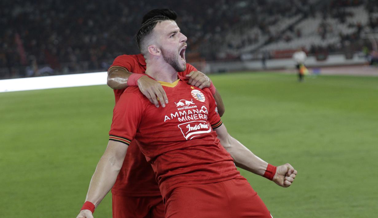 Striker Persija Jakarta, Marko Simic, melakukan selebrasi usai membobol gawang Geylang International FC pada laga uji coba di SUGBK, Jakarta, Minggu, (23/2/2020). Persija Jakarta menang dengan skor 3-1. (Bola.com/M Iqbal Ichsan)