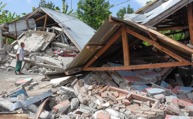 Gempa bumi di Lombok, NTB mengakibatkan banyak rumah roboh/copyright AFP/Aulia AHMAD