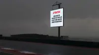 HUJAN - Hujan deras yang mengguyur Sirkuit Austin membuat pelaksanaan Latihan Bebas GP Amerika Serikat dibatalkan. (crash.net)