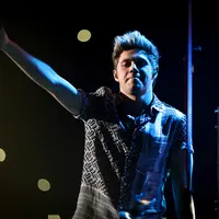 Hidup sebagai seorang pesohor terkenal di Hollywood dan selalu dikelilingi oleh penggemar fanatik tak selamanya terasa menyenangkan. Paling tidak, hal tersebut tengah dirasakan oleh Niall Horan, anggota boyband One Direction. (AFP/Christopher Polk)