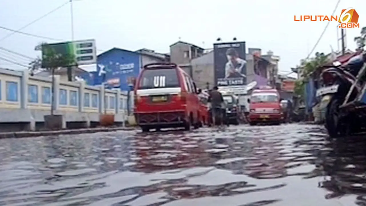 tanggul-jebol-131203c.jpg