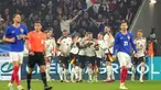 Para pemain Jerman merayakan gol yang dicetak Florian Wirtz pada laga persahabatan FIFA Matchday melawan Prancis di Stadion Groupama, Decines, Lyon, Prancis, Sabtu, 23 Maret 2024. (AP Photo/Laurent Cipriani)