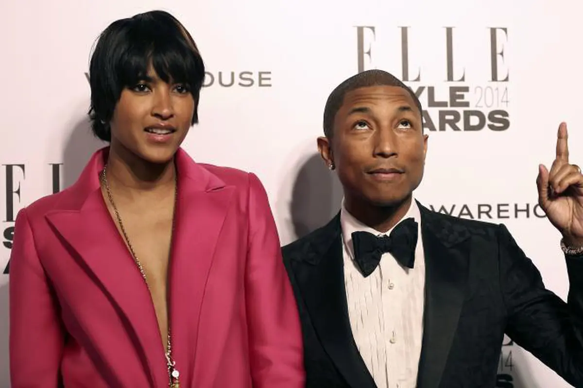 Intip Kemesraan Pharrell Williams dan Sang Istri di Depan Publik