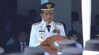 Mendagri Muhammad Tito Karnavian saat memberikan amanat pada acara Pelantikan Pamong Praja Muda Angkatan XXXII Tahun 2025 di Lapangan Parade, Kampus IPDN Jatinangor, Kabupaten Sumedang, Jawa Barat, Senin (28/7/2025).