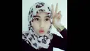 Nurul Habibah, Satpol PP berparas cantik itu memajang fotonya dalam beragam ekspresi. (Facebook.com)
