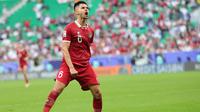 Ekspresi kebanggaan Sandy Walsh usai mencetak gol pertamanya untuk Timnas indonesia. Gol itu dicetak ke gawang Timnas Jepang dalam laga Grup D Piala Asia 2023, Rabu (24/1/2024). (Bola.com/Giuseppe Cacace)