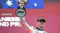 Kemenangan ini juga menjadi hadiah untuk pemasok mesin Red Bull Honda, mengingat balapan berlangsung di kandang mereka. (Toshifumi KITAMURA/AFP)