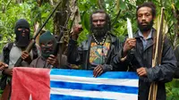 Lambert Pekikir (kedua dari kanan), salah satu pemimpin kelompok separatis yang pernah menguasai perbatasan Papua-Papua Nugini di Kabupaten Keerom. (Liputan6.com / Katharina Janur)