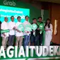 Manajemen Grab Indonesia bersama Geng Ojol, grup musik yang beranggotakan mitra pengemudi ojek online dari platform yang berbeda.