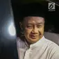 Mantan Kepala BPPN, Syafruddin Arsyad Temenggung tersenyum sesaat jelang meninggalkan Rutan KPK, Jakarta, Selasa (7/9/2019). Sebelumnya, Majelis Hakim Pengadilan Tipikor Jakarta menjatuhi vonis 13 tahun penjara dan denda Rp700 juta. (Liputan6.com/Helmi Fithriansyah)