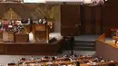 Ketua DPR Puan Maharani terlihat pada layar berpidato saat Rapat Paripurna Pembukaan Masa Persidangan IV Tahun Sidang 2020-2021 di Kompleks Parlemen, Senayan, Jakarta, Senin (8/3/2021). Rapat Paripurna tersebut beragenda pidato pembukaan masa persidangan oleh Ketua DPR. (Liputan6.com/Angga Yuniar)