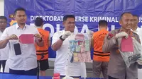Konferensi pers penahanan Kepala Dinas Kesehatan Kabupaten Kampar dan Kepala Puskesmas Siberuang oleh Polda Riau beberapa waktu lalu. (Liputan6.com/M Syukur)