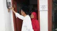 Presiden  Joko Widodo (Jokowi) meresmikan penyambungan listrik gratis kepada 30.937 rumah tangga miskin dan rentan miskin di Garut, Jawa Barat, Jumat (18/1/2019). Dok Kementerian BUMN