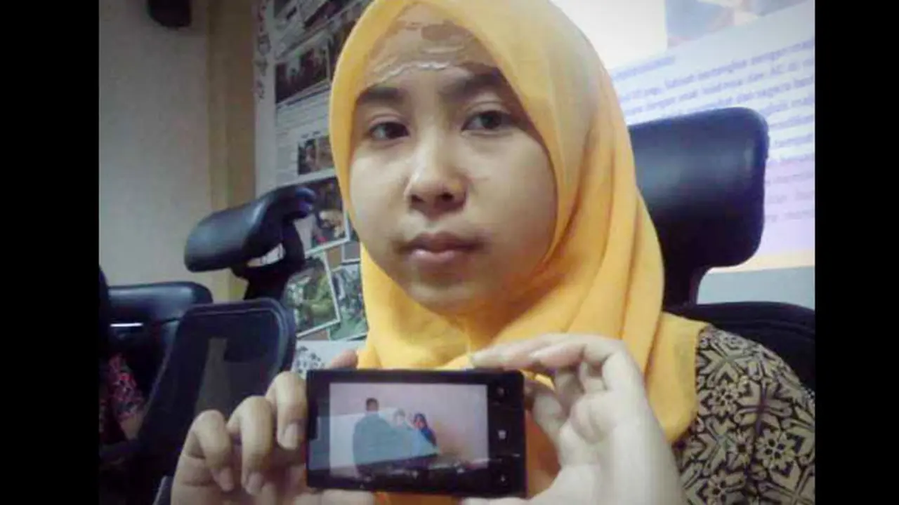 putri-tki-satinah-140211c.jpg