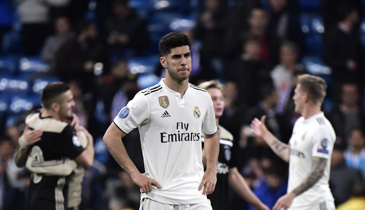 3. Marco Asensio - Penyerang muda yang dipercaya menjadi pemain masa depan Real Madrid. Kepergian Ronaldo serta bangkitnya Karim Benzema membuat Asensio terpinggrikan. (AFP/Javier Soriano)