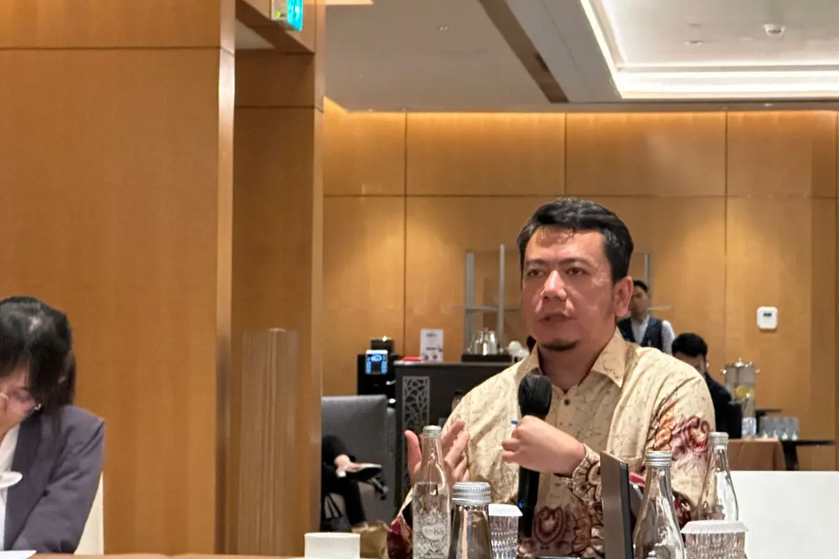 Kepala BPPTIK Kementerian Komunikasi dan Informatika RI Hamdani Pratama dalam paparan kepada peserta Indonesia Korea Journalis Network 2024 di Jakarta, Kamis (10/10/2024). (Liputan6.com/Benedikta Miranti)