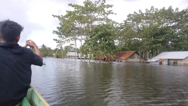 Banjir Konawe, merendam rumah warga hingga setinggi 2 meter.(Liputan6.com/Ahmad Akbar Fua)