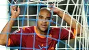 Ekspresi striker AS Roma Adriano ketika berhadapan dengan Brescia pada partai Serie A di Stadio Mario Rigamonti, 22 September 2010. AFP PHOTO/ALBERTO PIZZOLI
