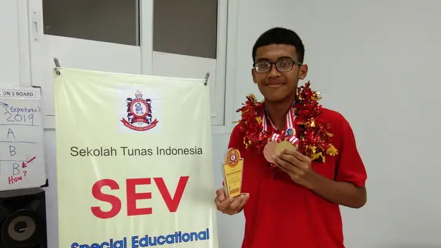 Michael Anggito Baskoro, peraih emas dan perunggu di dua cabang olahraga ASEAN Autism Games 2018 (Giovani Dio Prasasti/Liputan6.com)