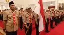 Ketua Kwarnas Pramuka Budi Waseso (kiri) saat menghadiri upacara pelepasan Kontingen Gerakan Pramuka Indonesia di Istana Negara, Jakarta, Jumat (19/7/2019). Pramuka Indonesia akan terbang ke Virginia Barat untuk menghadiri Jambore Pramuka Dunia XXIV. (Liputan6.com/Angga Yuniar)