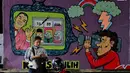 Dalam mural tersebut berisi pesan ajakan pada masyarakat untuk menggunakan hak pilihnya dalam Pemilu yang berlangsung April 2014 mendatang (Liputan6.com/Johan Tallo)