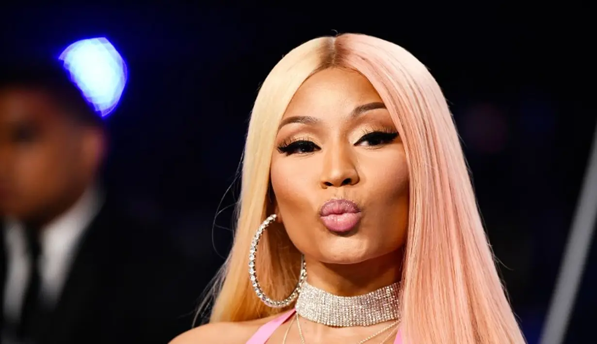 Nicki Minaj miliki keturunan Afro-Trinidadian di dalam darahnya dari sang ibu sementara ayahnya adalah orang India Selatan. (FRAZER HARRISON / GETTY IMAGES NORTH AMERICA / AFP)