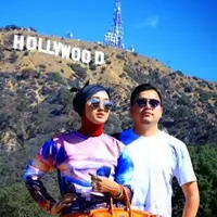 Sebelum Gugatan Cerai, Ini Liburan Mesra Dian Pelangi dan Suami. (Foto: Instagram @tito.haris, Desain: Muhammad Iqbal Nurfajri/Bintang.com)