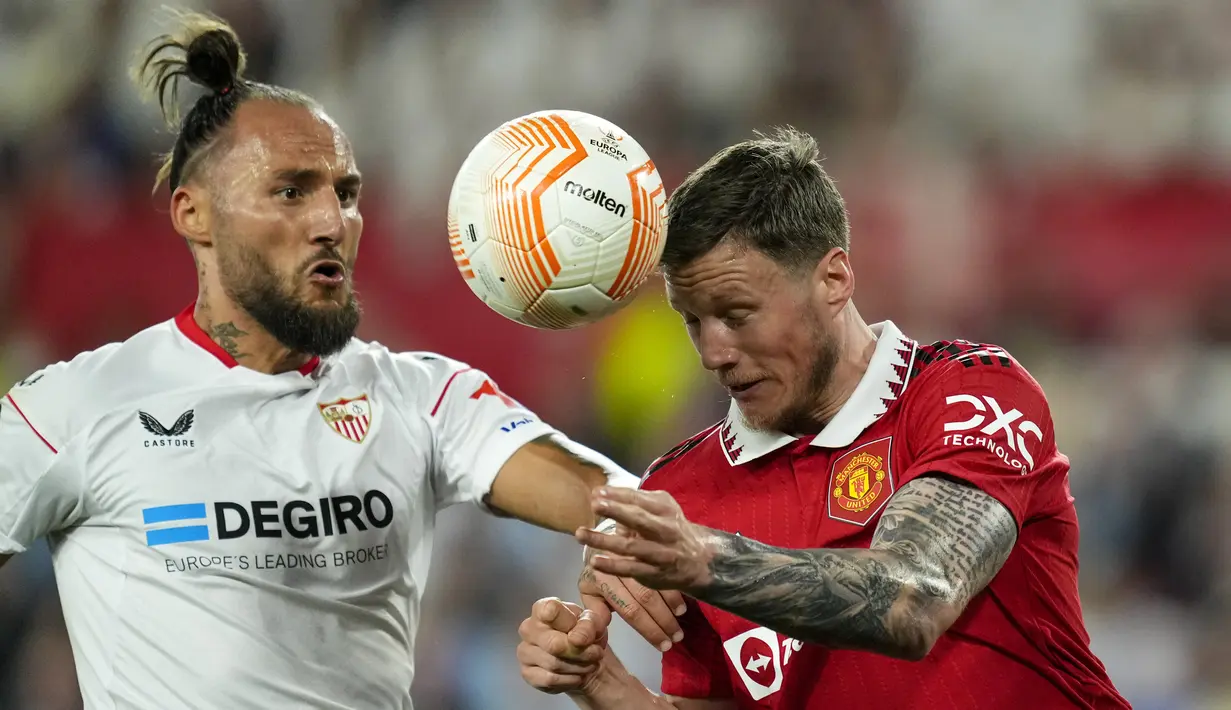 Youssef En-Nesyri menjadi aktor utama kemenangan Sevilla. Ia mencetak dua gol di menit ke-8 dan menit ke-80. (AP Photo/Jose Breton)