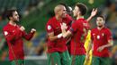 Para pemain Portugal merayakan gol yang dicetak oleh  Diogo Jota ke gawang Swedia pada laga UEFA Nations League di Stadion Jose Alvalade, Kamis (15/10/2020). Portugal menang dengan skor 3-0. (AP Photo/Armando Franca)