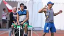 tlet tolak peluru Asian Para Games 2018 dari negara Uzbekistan menyimak arahan pelatihnya saat latihan di Stadion Madya, Kompleks GBK, Jakarta, Kamis (4/10). Ada 18 cabang olahraga dengan 586 nomor pertandingan. (Liputan6.com/Helmi Fithriansyah)