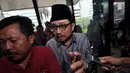 Waryono Karno (kanan) diperiksa KPK sebagai tersangka atas dugaan kasus pemberian hadiah atau janji dalam penyelenggaraan kegiatan di Kementerian ESDM, Jakarta, Kamis (4/12/2014). (Liputan6.com/Miftahul Hayat)
