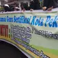 Aksi damai guru di Pekanbaru menuntut TPP dibayar oleh Pemerintah Kota Pekanbaru. (Liputan6.com/M Syukur)