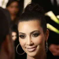 Kim Kardashian dikabarkan tengah menghadapi masa kelam akibat sakit yang diderita Kanye West dan trauma pada dirinya. Namun di tengah itu semua, Kim tetap merayakan ulang tahun Saint West yang pertama. (AFP/Bintang.com)
